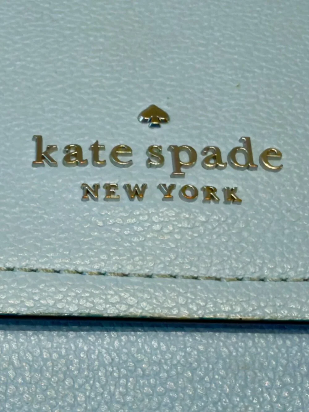 Kate Spade New York crossbody bag in light blue with coin pouch
